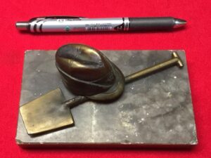 RAD DESK ORNAMENT CAP AND SHOVEL